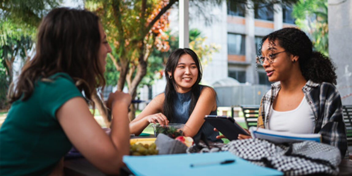 Group of students sitting and having lunch